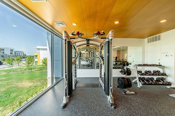 A gym with a view of the outside.