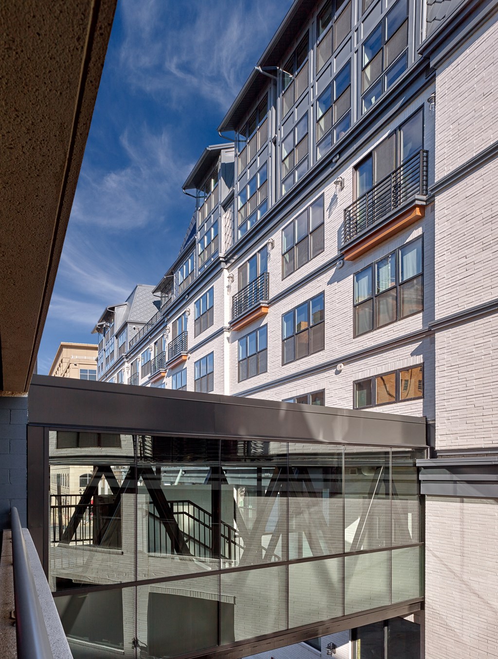 a view of the facade of a building with a glass walkway at 520 Lofts, Pennsylvania