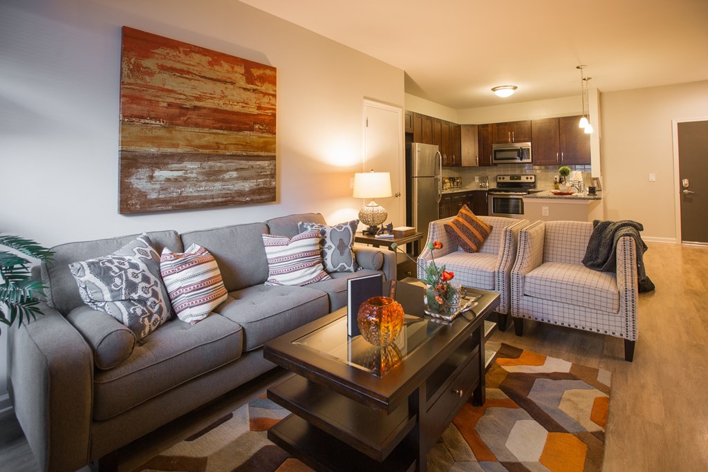 a living room with a couch and a table