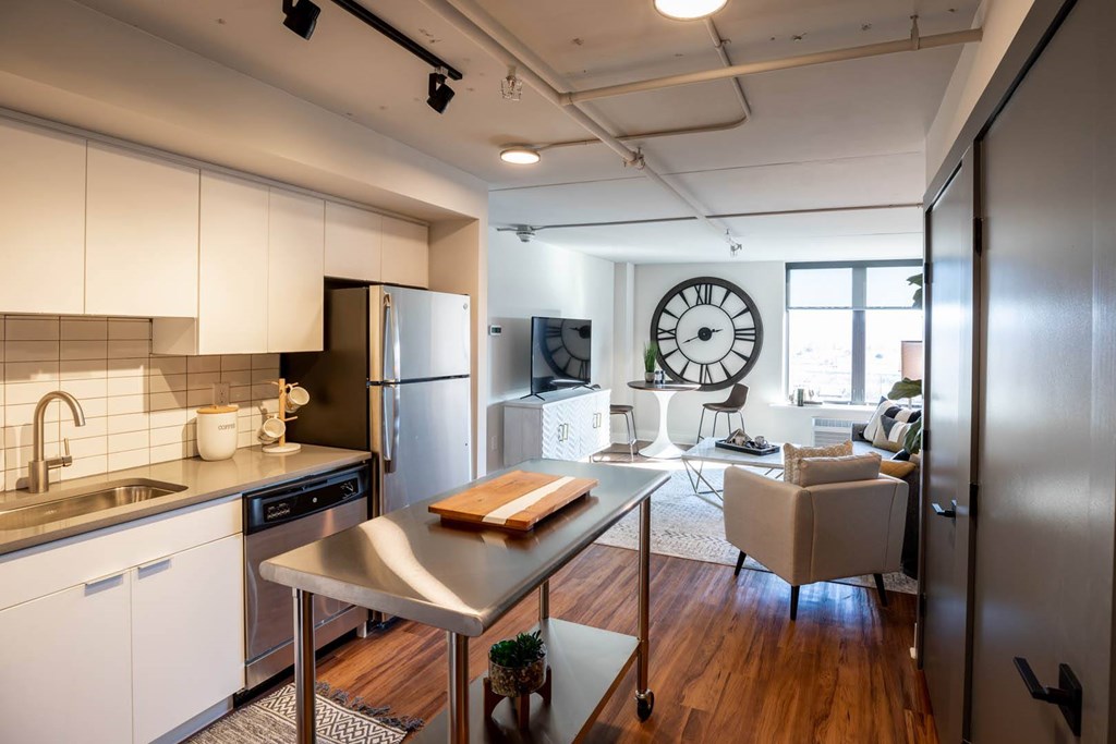 A modern kitchen with a table and chairs in the living room at Cityplace Apartment Homes Apartments, Pennsylvania