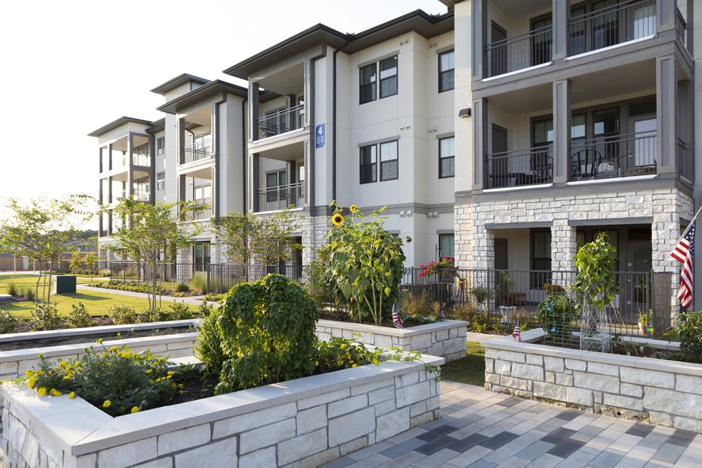 community garden with raised garden beds at a senior apartment community