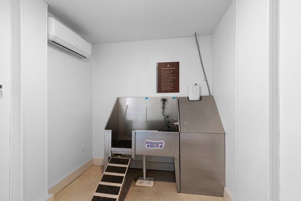 a kitchen with a stainless steel counter and a sink