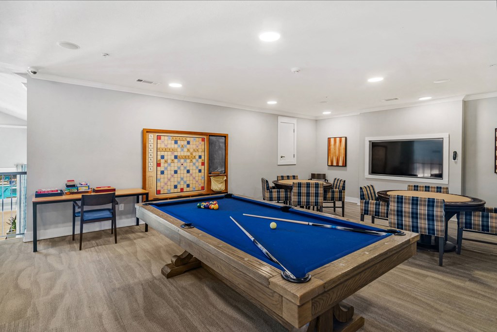 the preserve at ballantyne commons activity room with pool table and tv
