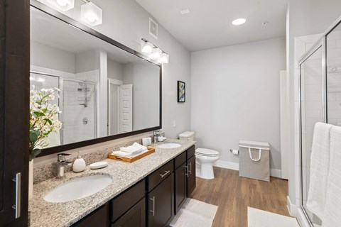 a bathroom with a double sink