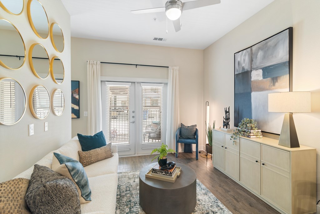 a living room with a patio at a senior apartment community