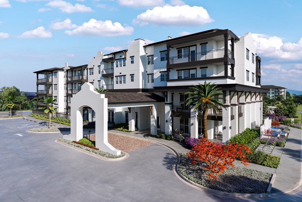 a large building with a arch in front of it