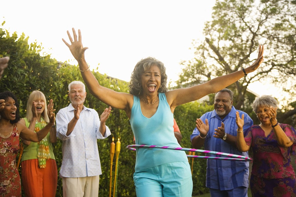a group of people playing with hula hoops