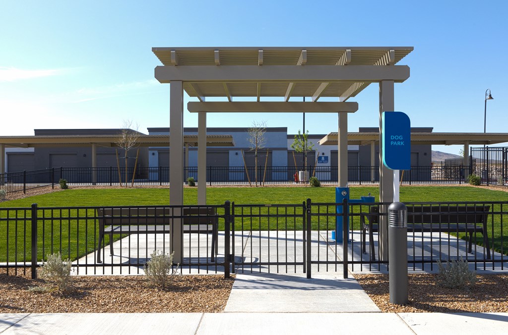 a fenced-in lawn at a senior apartment community