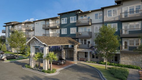 A modern apartment complex with a central courtyard and a variety of trees and plants.