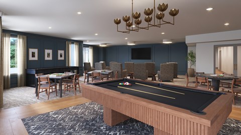 A pool table is in the middle of a room with a blue wall and a TV.