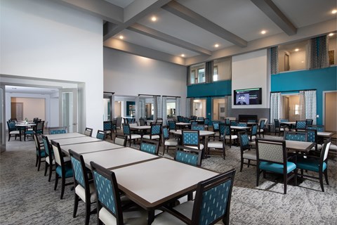 a resident dining area at a senior apartment community