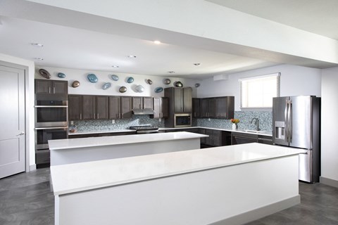 a resident community kitchen at a senior apartment community