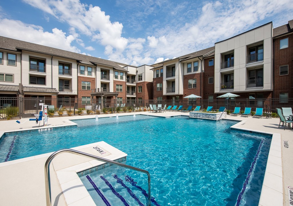 a resort-style swimming pool at a senior apartment community