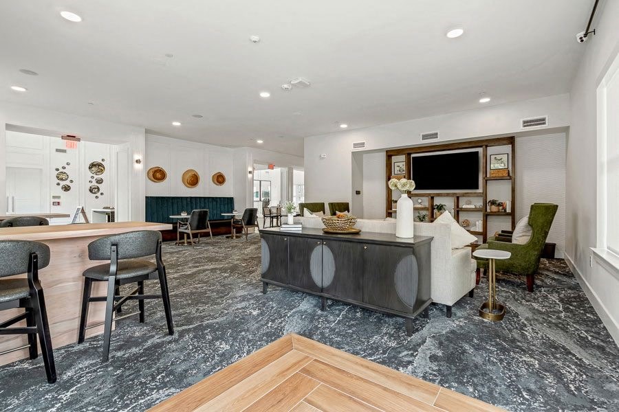 a communal clubhouse lounge area at a senior apartment community