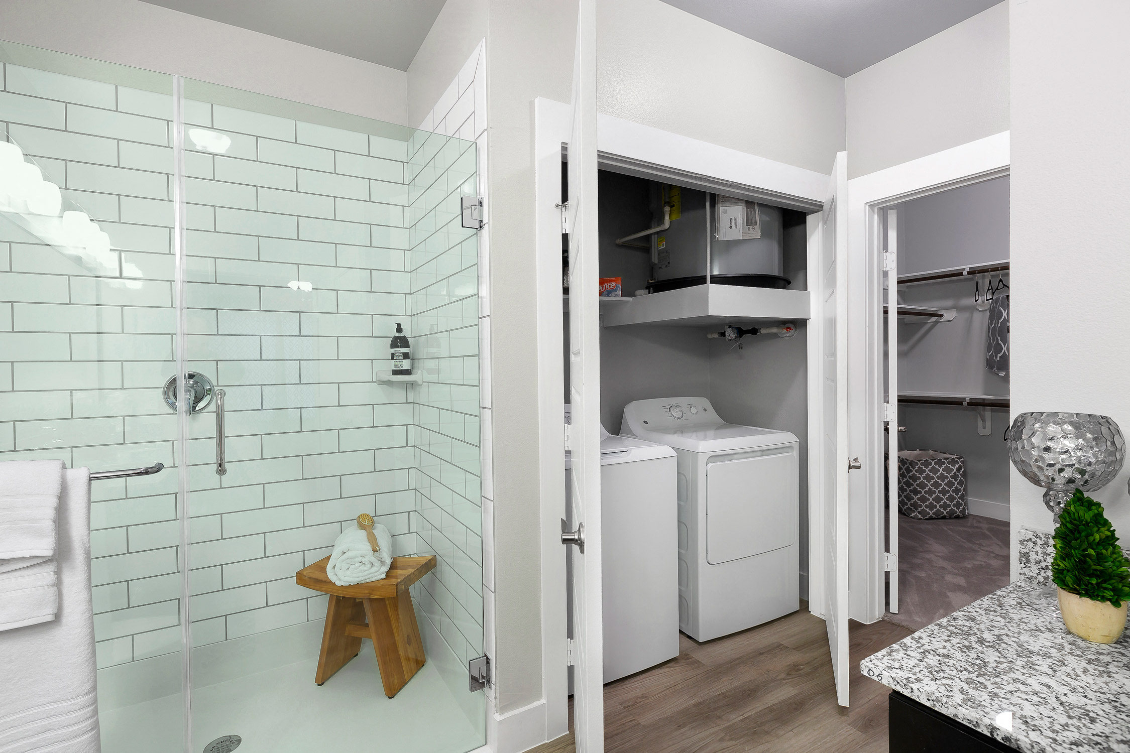 Separate showers with glass enclosures at Cedar Park Senior Apartments in Cedar Park Texas