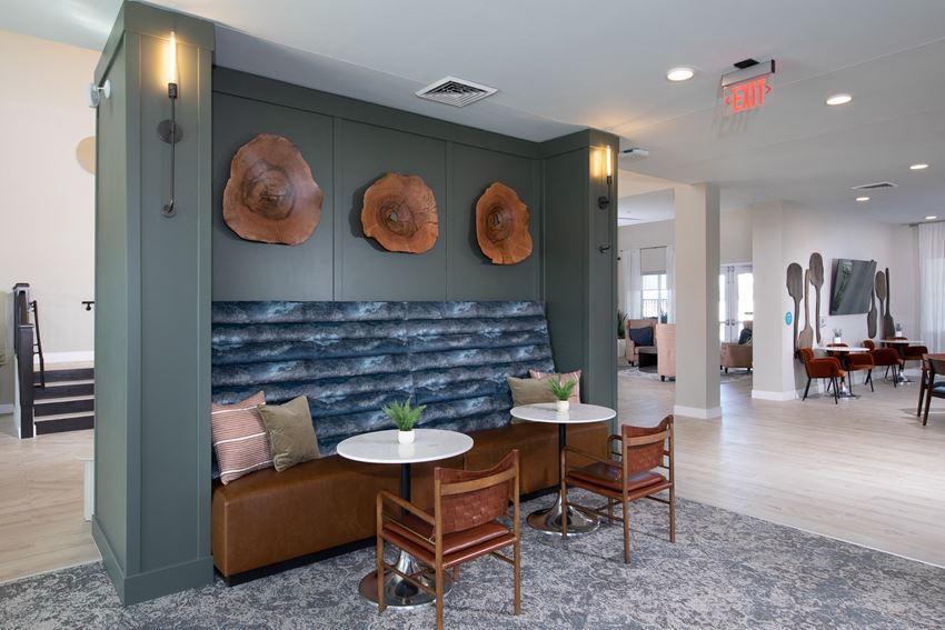 lounge area in two story clubhouse - Photo Gallery