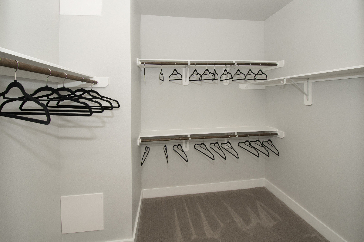 Walk in closet at Solea Cedar Park Senior Apartments in Cedar Park Texas