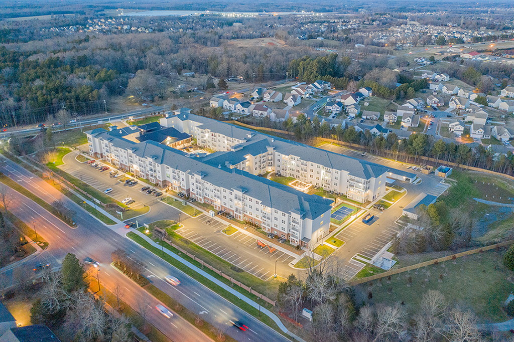 an aerial view of an office building at night