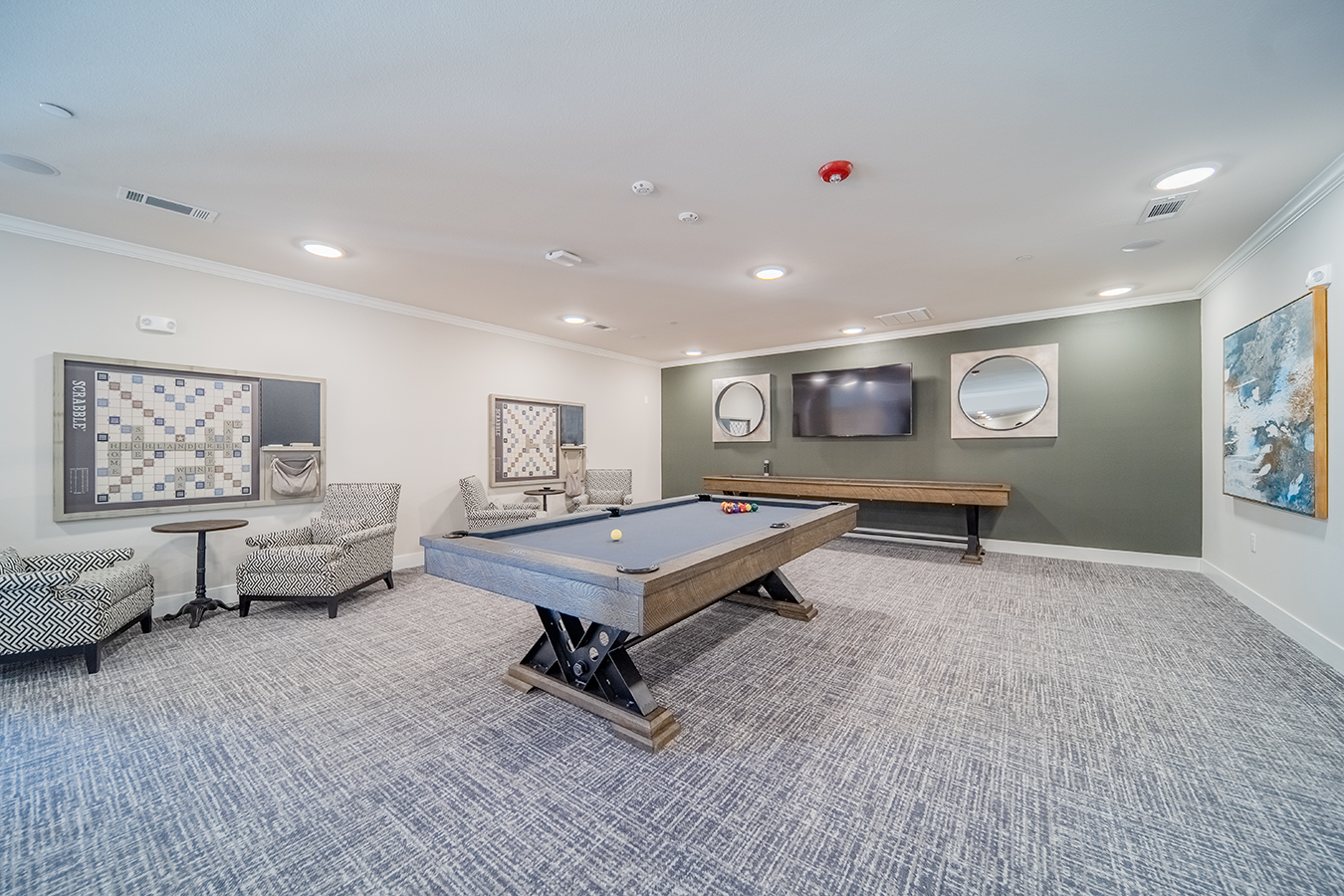 the preserve at ballantyne commons community game room with pool table and television