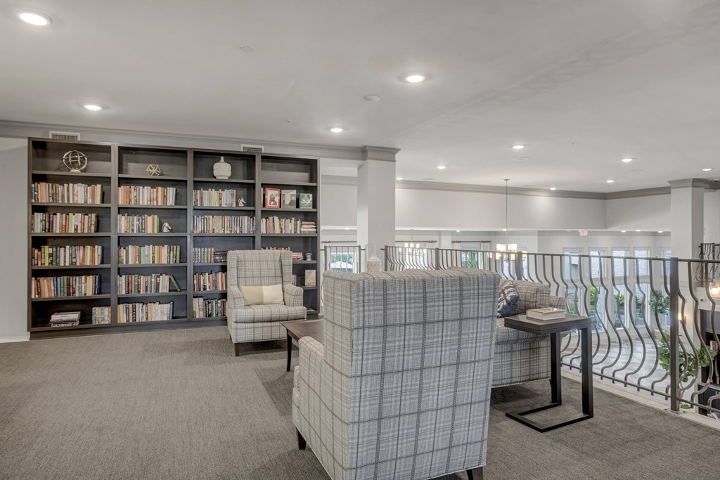 the lobbies at the landing of the avalon have couches and a library