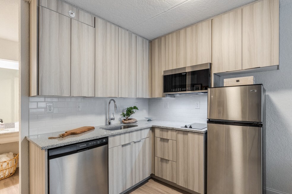 our apartments offer a modern kitchen with stainless steel appliances our apartments offer a modern kitchen with stainless steel appliances at The Teale, Kissimmee, FL, 34746