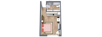 A top-down view of a small apartment with a bed, desk, and kitchenette at The Teale Golden Gate in Naples, FL, 34116