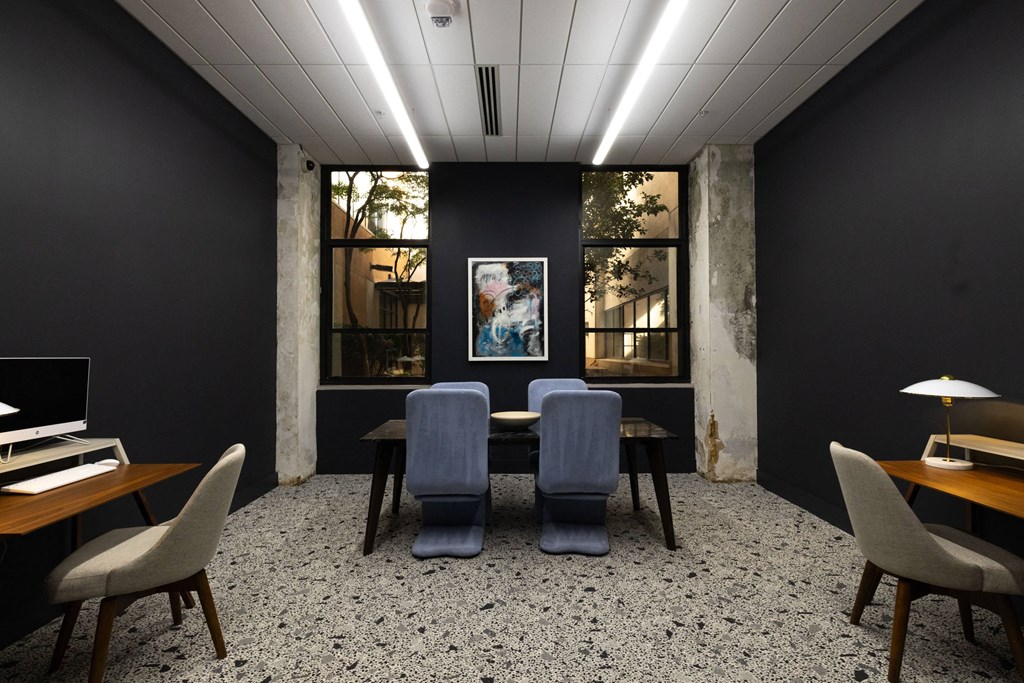 a conference room with a table and chairs  at The Lady, Columbia, 29201