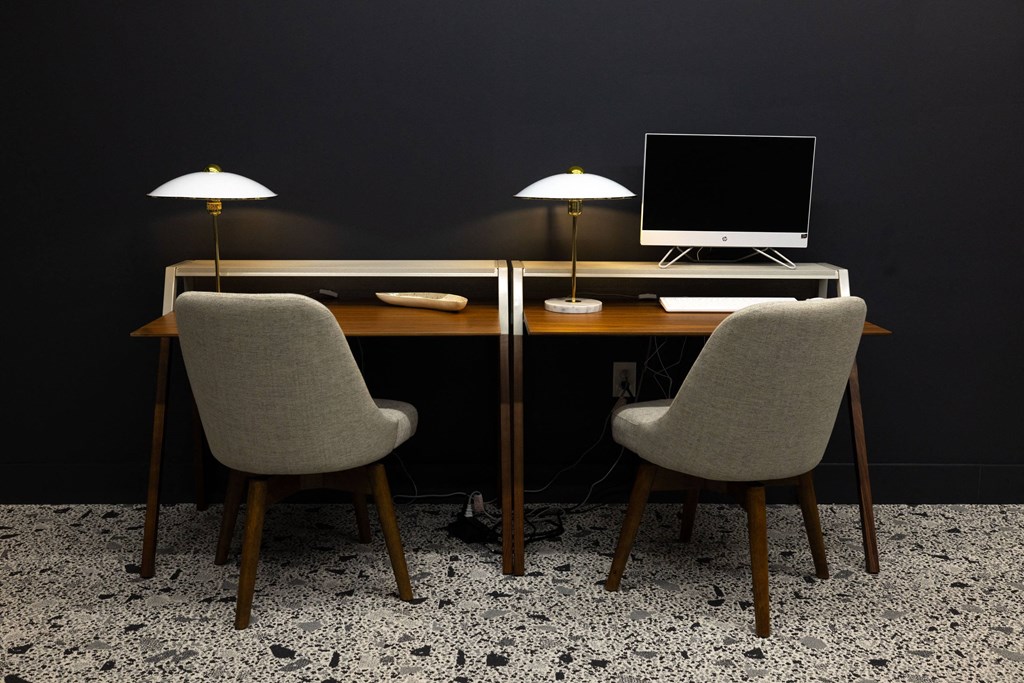 a desk with two chairs and a computer on it  at The Lady, South Carolina