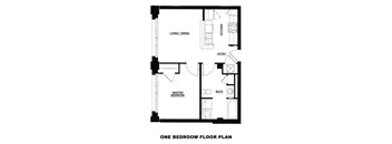a floor plan of a one bedroom floor plan with a bathroom and a staircase