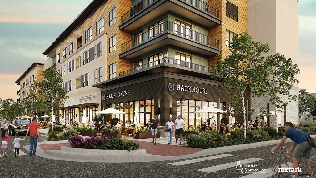 A rendering of a multi-story building with the name at The District at Deerfield Residences Apartments, Mason, 45040