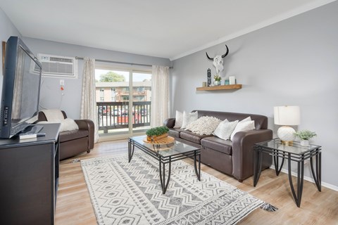Living room at Berrytree Apartments near Michigan State University in East Lansing, MI