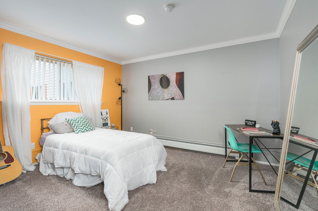 Bedroom at Capitol Villa Apartments near Michigan State University in East Lansing, MI