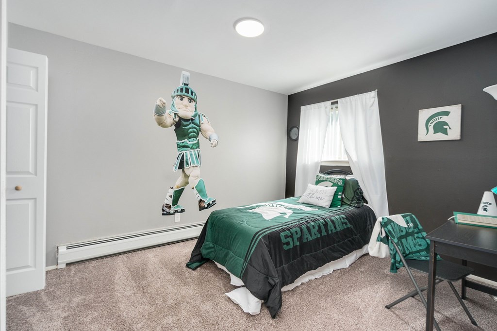 Bedroom at Capitol Villa Apartments near Michigan State University in East Lansing, MI