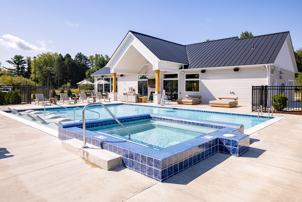 Clubhouse swimming pool at Okemos Apartments | Okemos Grand Reserve