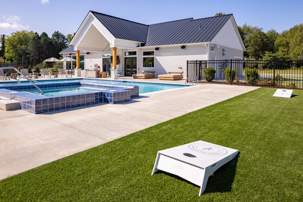 Clubhouse swimming pool at Okemos Apartments | Okemos Grand Reserve