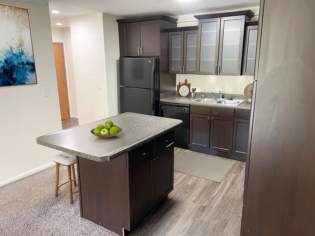 A spacious kitchen at apartments in East Lansing near Michigan State University | Americana Apartments in East Lansing, Michigan