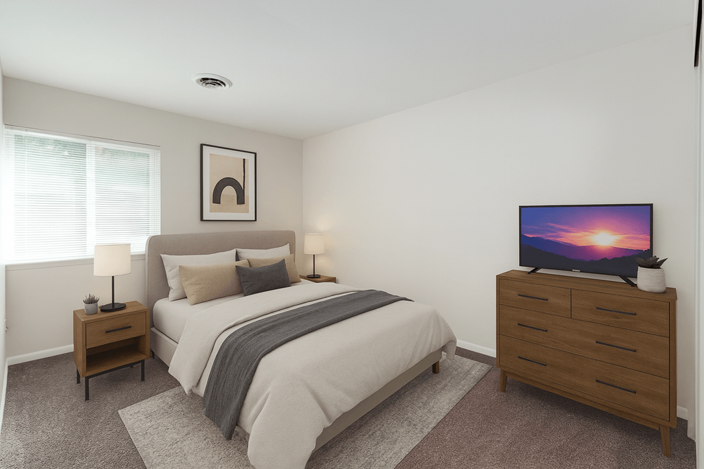 A bedroom with a bed, nightstand, and a television on a dresser.
