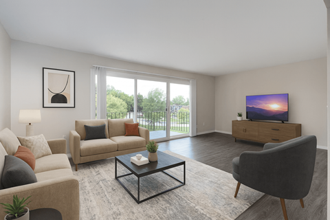 A living room with a grey chair, a white sofa, a black coffee table, a flat screen TV and a painting on the wall.