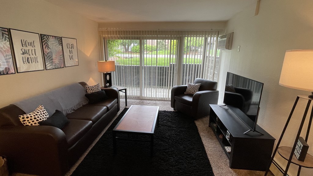 Living room at Cedar Village Apartments near Michigan State University in East Lansing, MI