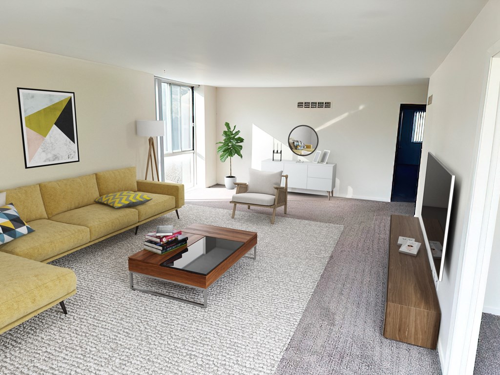 a living room with a couch and a coffee table