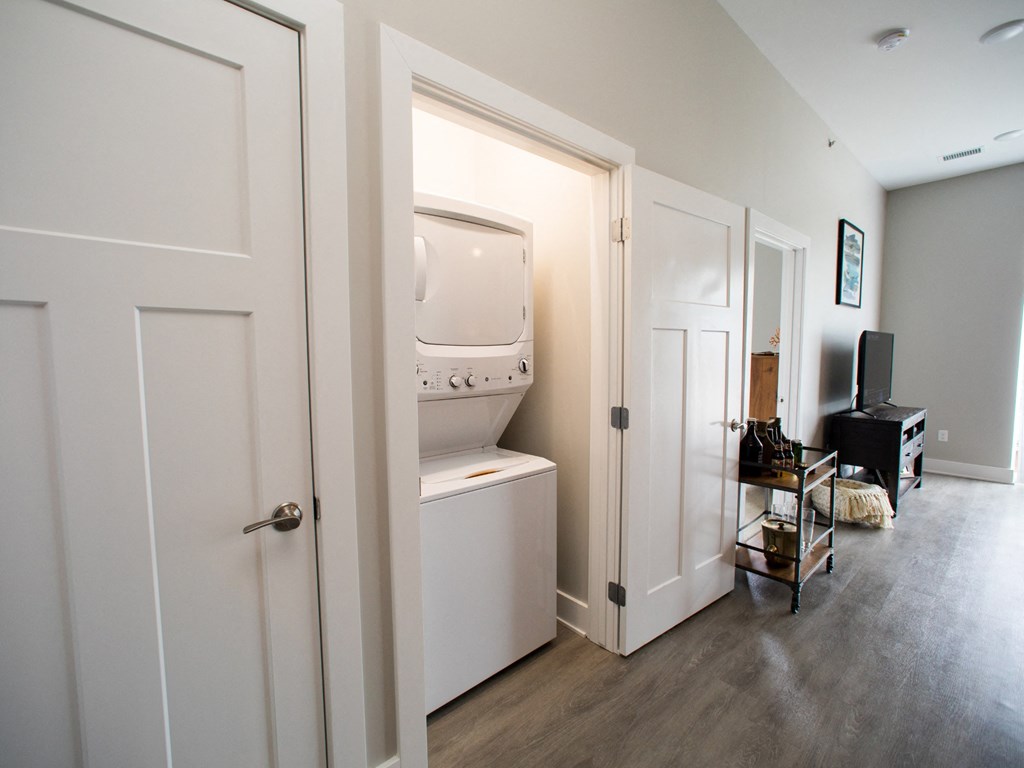 a laundry room with a washer and dryer