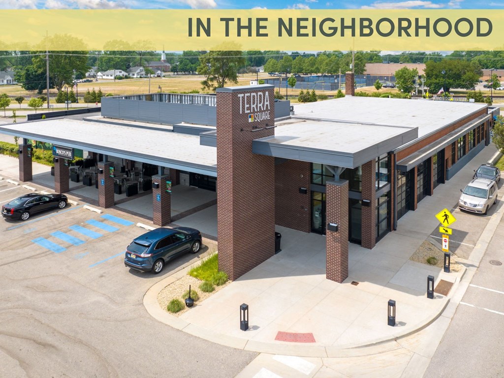 a photo of a building with the words in the neighborhood on top of it