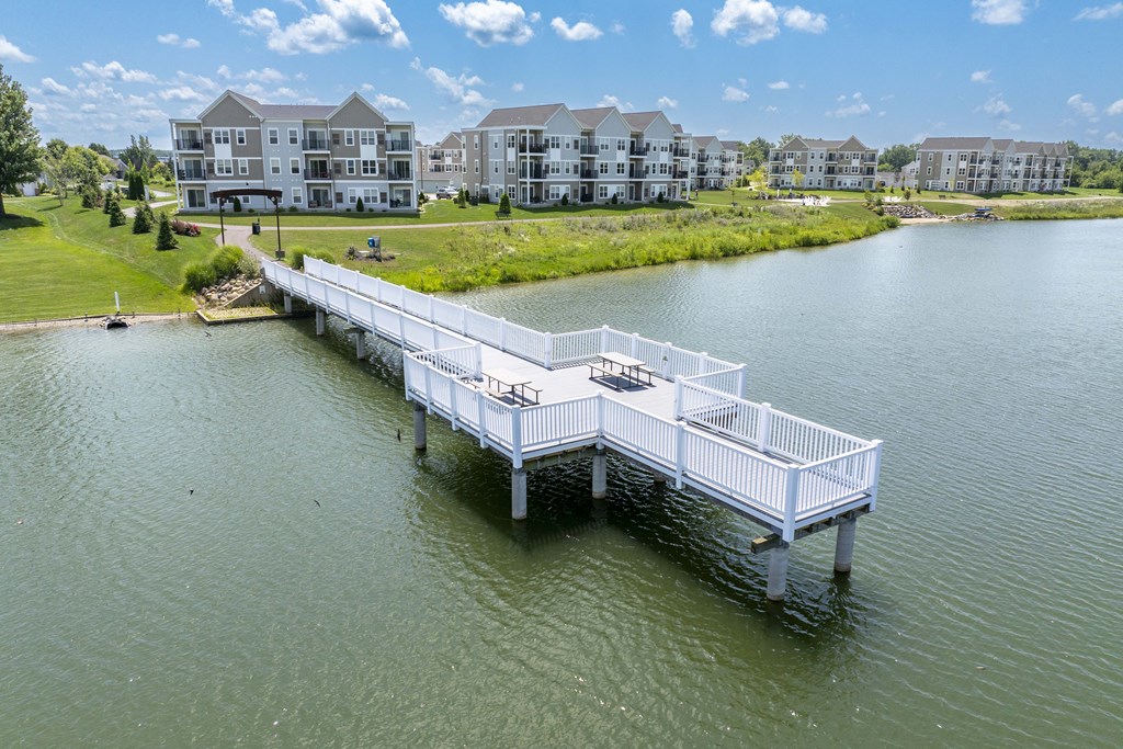 Private lake and dock at Hudsonville, MI Apartments and Townehomes | Elmwood Lake Apartments in Hudsonville MI