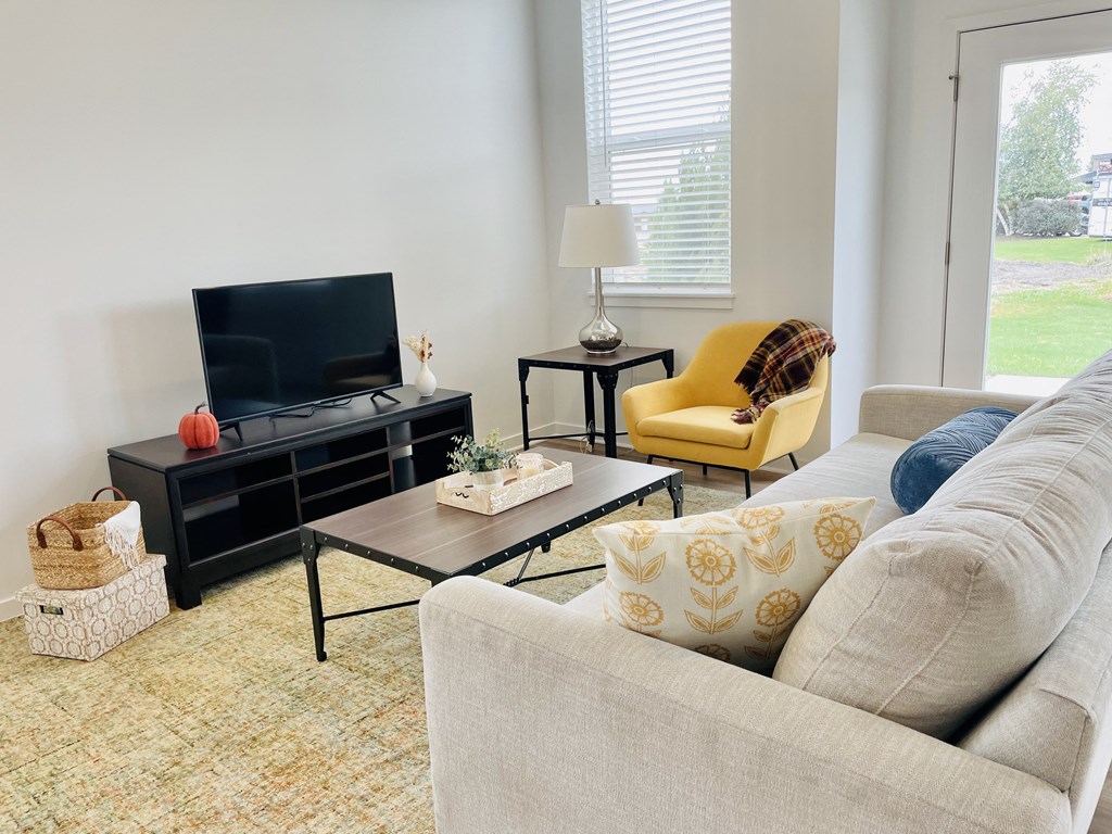 Living room in townhome at Elmwood Lake Apartments in Hudsonville MI