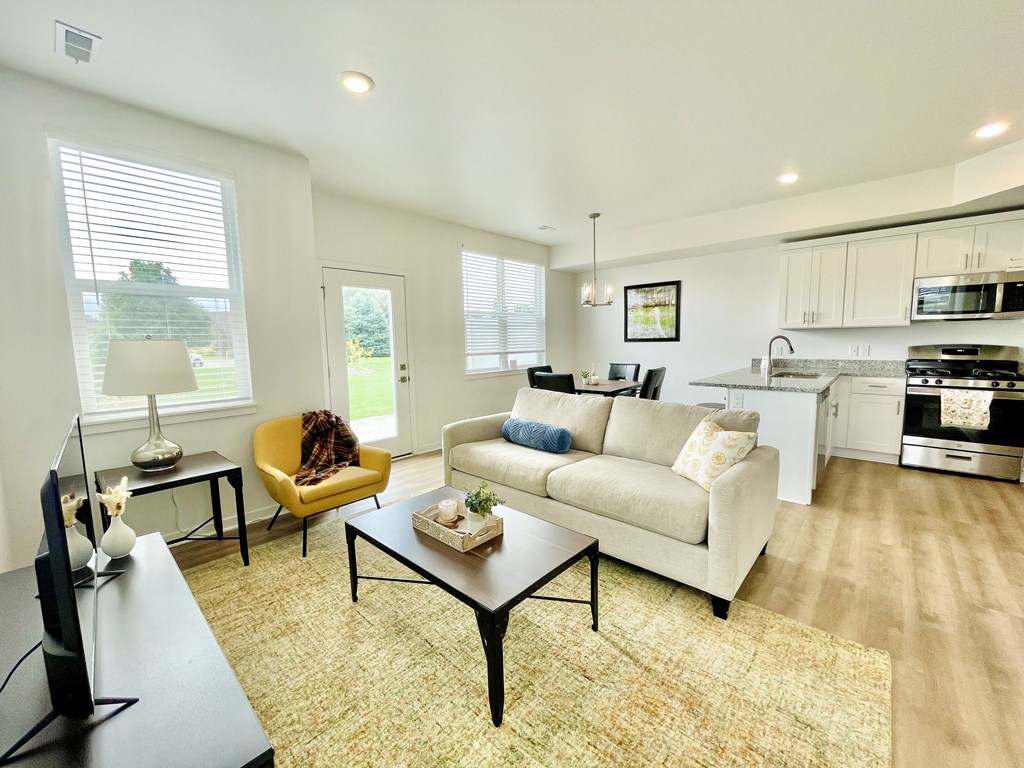 Living room in townhome at Elmwood Lake Apartments in Hudsonville MI