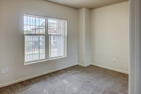 Bedroom at the Hamptons Apartments near Michigan State University