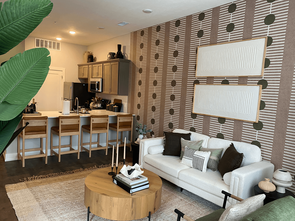 Spacious living room and kitchen at Newton Place Apartments in Haslett, Michigan