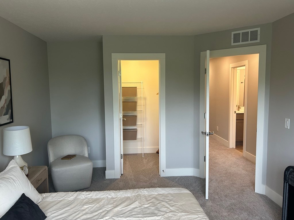 Spacious bedroom at Okemos Grand Reserve Apartments in Okemos, MI
