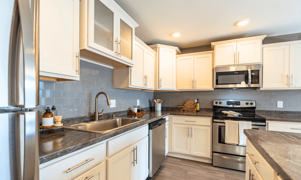 Updated kitchen in Lansing Apartments | Pine Lane Estates Apartments near Eastwood Towne Center