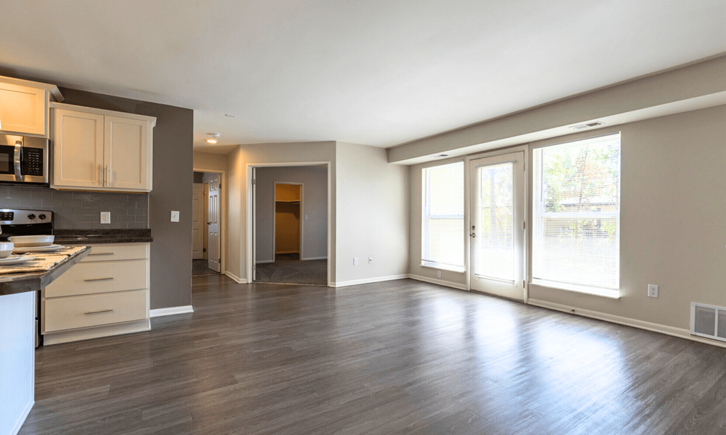 Renovated Open living room at Pine Lane Estates Apartments in Lansing, MI
